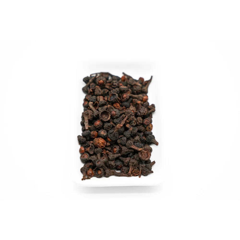 Baies de cannelier - Poivres